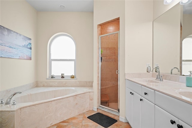 bathroom featuring oversized vanity, separate shower and tub, double sink, and tile flooring