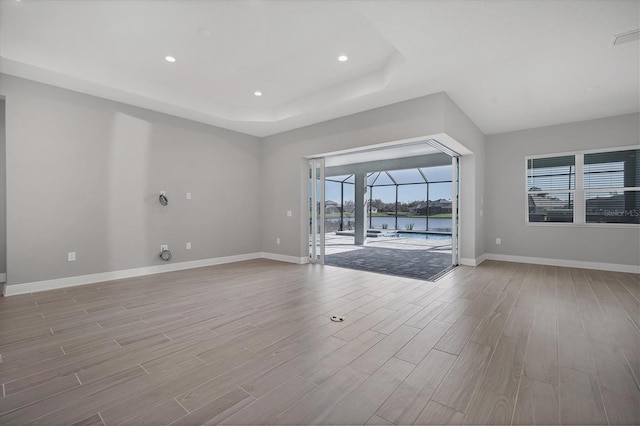 unfurnished living room with light wood-type flooring