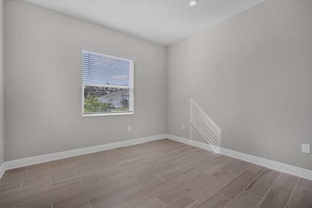 spare room featuring light wood-type flooring