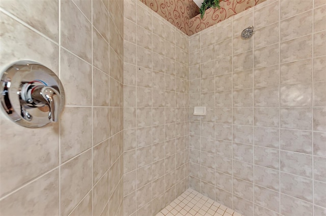 bathroom with tiled shower