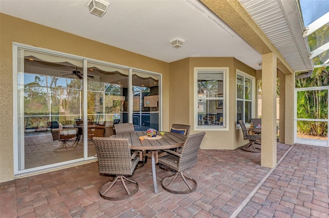 view of patio with ceiling fan