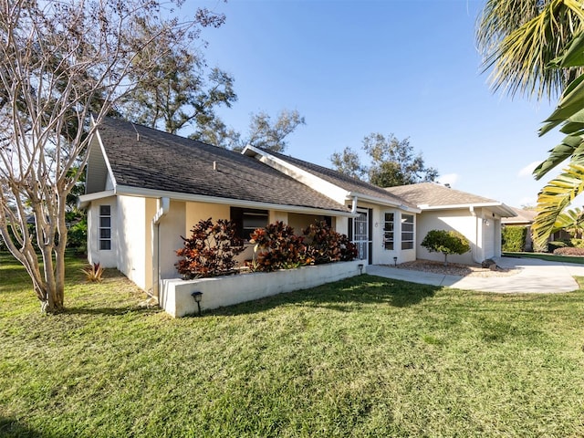 ranch-style house with a front yard