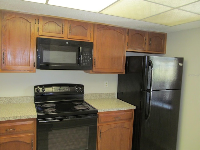 kitchen with black appliances