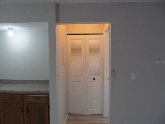 hall featuring light wood-type flooring