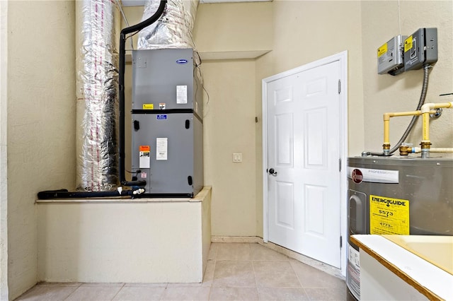 utility room with water heater and heating utilities