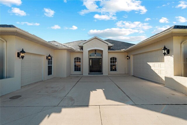 property entrance with a garage