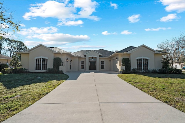 ranch-style home with a front yard