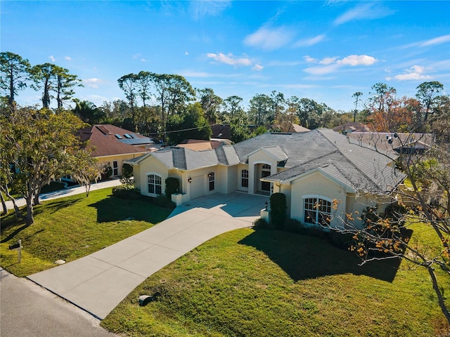 view of front of property with a front lawn