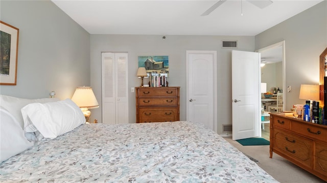 carpeted bedroom with ceiling fan