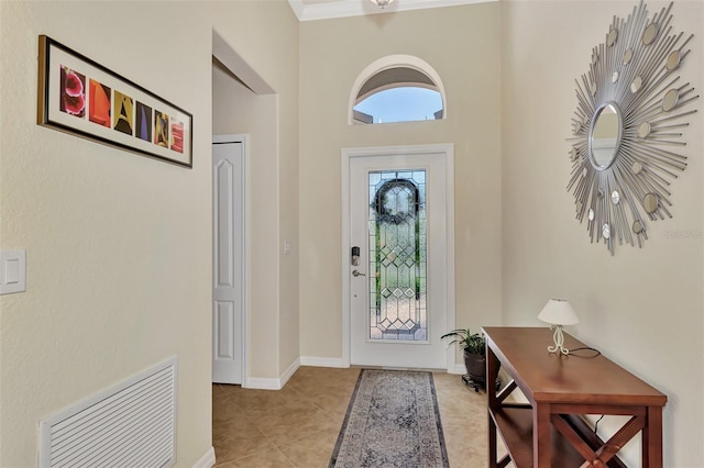 view of tiled foyer entrance