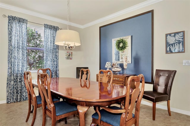 tiled dining room featuring ornamental molding and an inviting chandelier