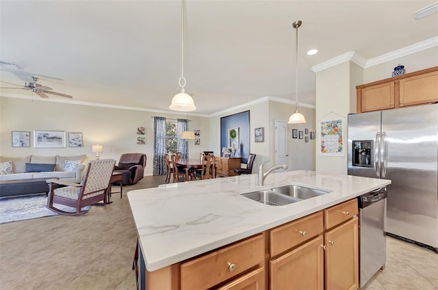 kitchen with an island with sink, stainless steel appliances, light tile floors, decorative light fixtures, and ceiling fan