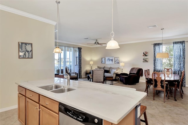 kitchen with decorative light fixtures, ceiling fan, a kitchen island with sink, and dishwasher