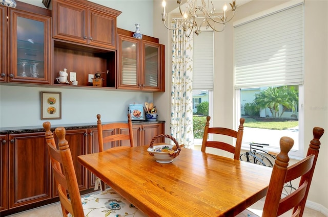 dining space featuring an inviting chandelier