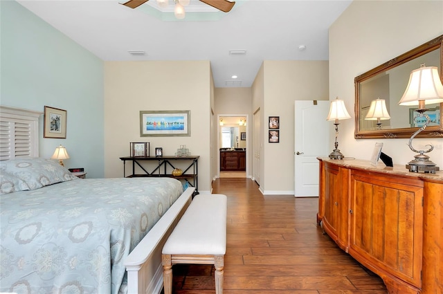 bedroom featuring ceiling fan and dark wood-type flooring