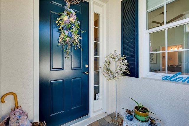 doorway to property with a porch