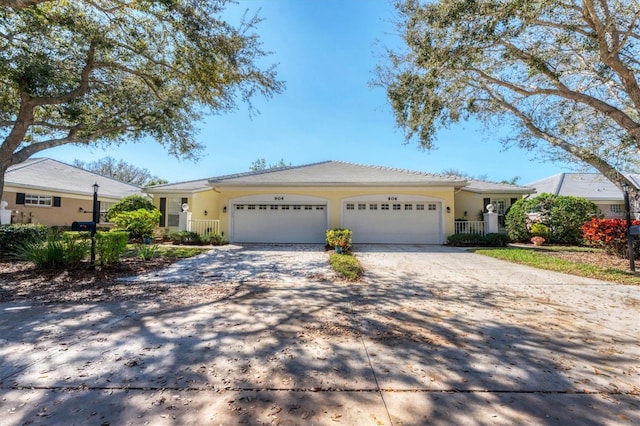 single story home with a garage