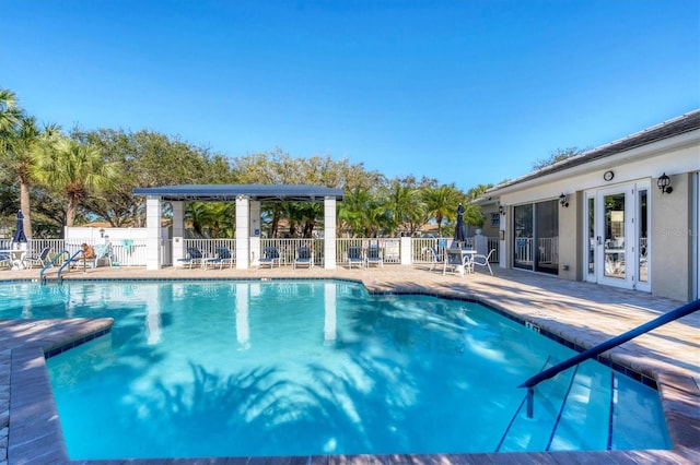 view of pool featuring a patio area