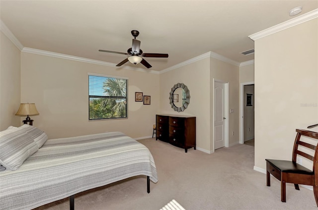 carpeted bedroom with ceiling fan and crown molding