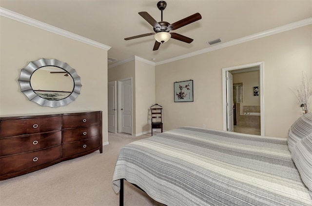 bedroom featuring ensuite bath, crown molding, ceiling fan, and light carpet