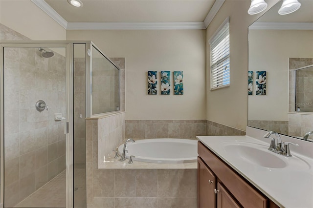 bathroom with vanity, separate shower and tub, and crown molding