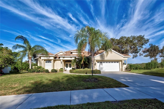 ranch-style house with a front yard and a garage