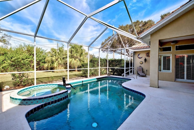 view of swimming pool featuring a patio area, an in ground hot tub, and a lanai