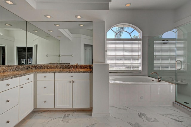 bathroom with separate shower and tub, tile floors, and oversized vanity