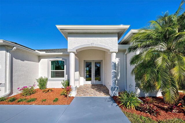 property entrance with french doors