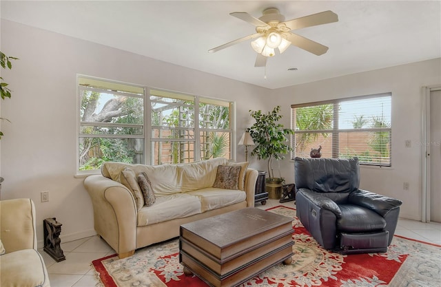 living room with ceiling fan and light tile floors