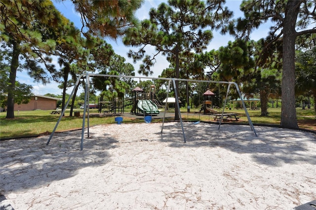 view of jungle gym with a lawn