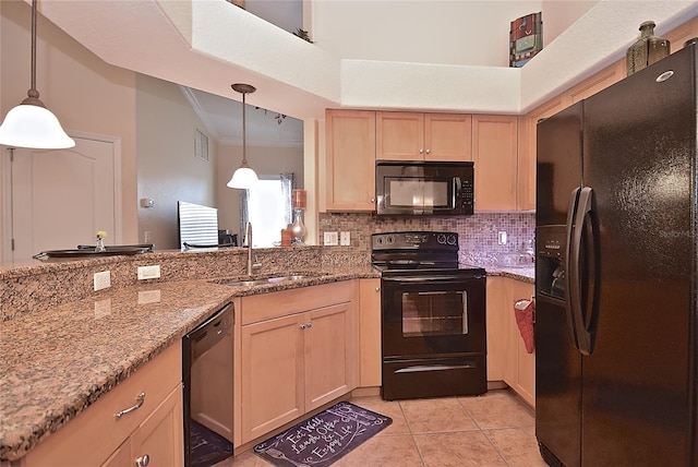 kitchen featuring decorative light fixtures, sink, light tile floors, and black appliances