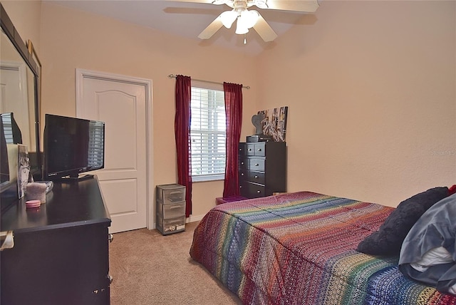 bedroom with light colored carpet and ceiling fan