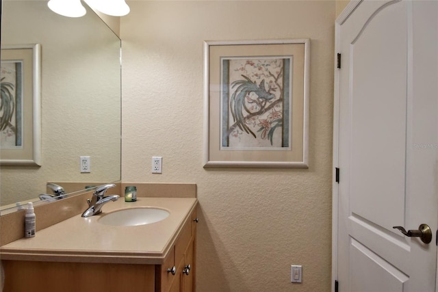 bathroom featuring large vanity