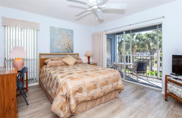 bedroom with access to outside, a textured ceiling, ceiling fan, and light hardwood / wood-style flooring