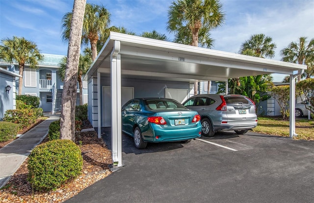 view of car parking featuring a carport