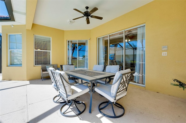 view of patio featuring ceiling fan