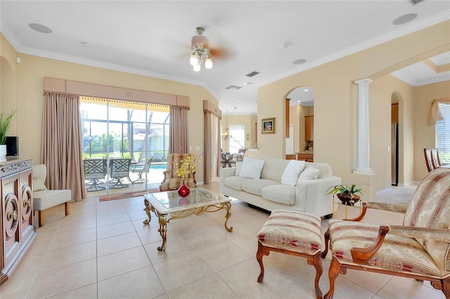 tiled living room with crown molding, decorative columns, and ceiling fan