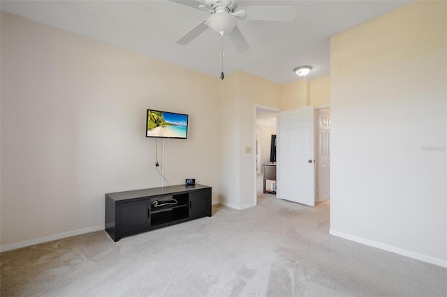 miscellaneous room with ceiling fan and light colored carpet