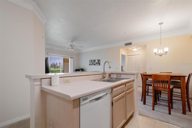 kitchen with light colored carpet, decorative light fixtures, ceiling fan with notable chandelier, dishwasher, and sink