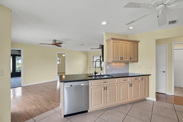 kitchen with ceiling fan, sink, dishwasher, and light tile patterned floors