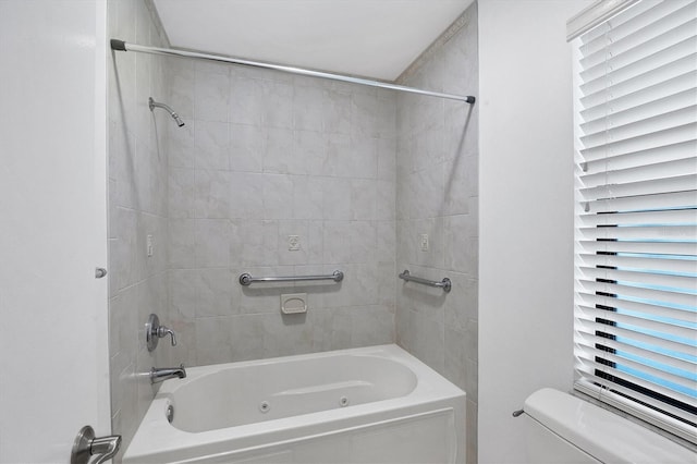 full bathroom featuring toilet and bathing tub / shower combination