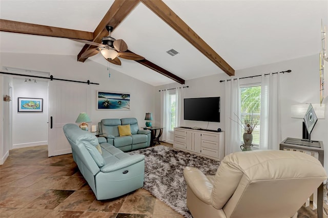 living room featuring lofted ceiling with beams, plenty of natural light, ceiling fan, and a barn door