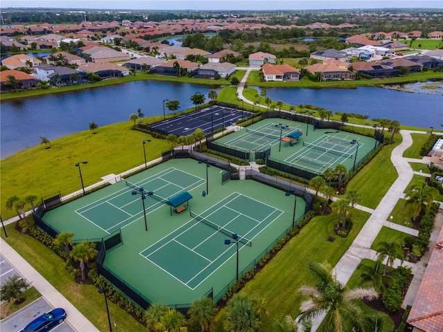 bird's eye view with a water view