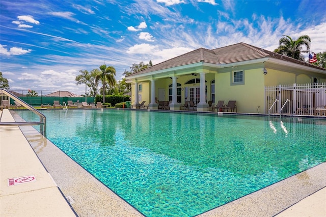 view of swimming pool featuring a patio area