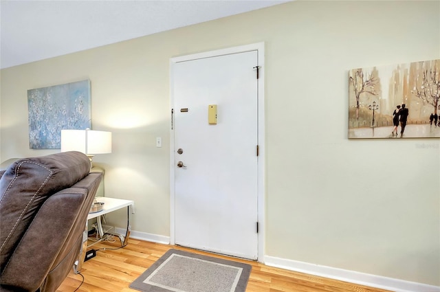 entryway with light hardwood / wood-style floors