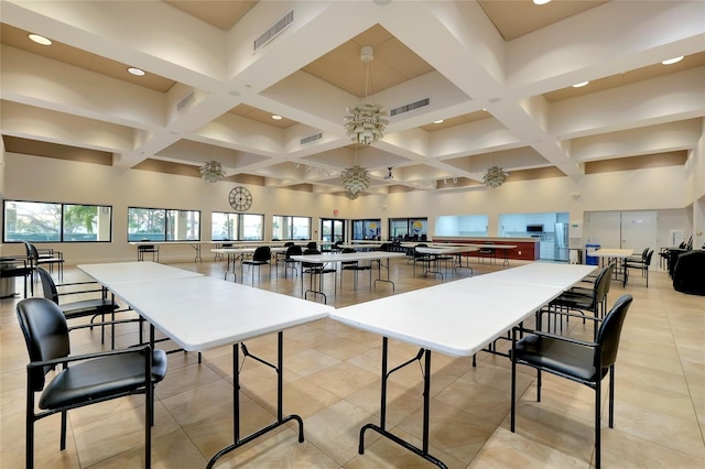 interior space with coffered ceiling, ceiling fan, and beam ceiling