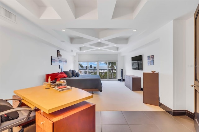 office area with coffered ceiling, beamed ceiling, and light tile patterned flooring