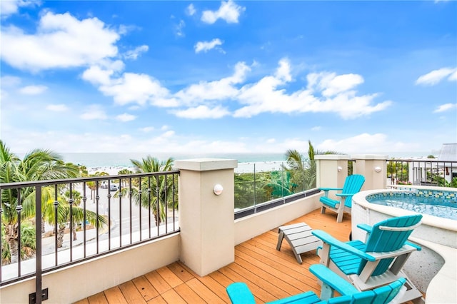 wooden deck with a water view