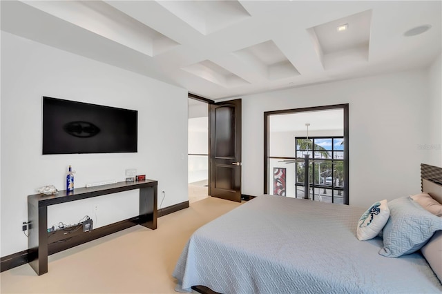 carpeted bedroom featuring beamed ceiling and coffered ceiling